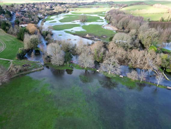 Flooding at Pook Lane and Sheepwash Lane, East Lavant after the River Lavant burst its banks