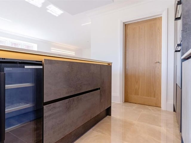 Offers in excess of £925,000 are invited for this new luxury property in Mill Lane, High Salvington. It has beautiful views over the South Downs, versatile and spacious accommodation.