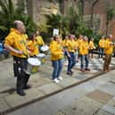 Sambalanco drumming in Hastings Old Town to raise funds towards Jack in the Green after the council pulled its funding for the event from 2025.