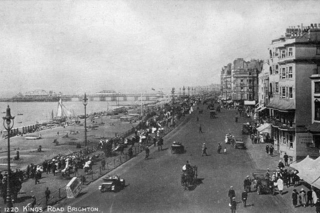 A typical beach scene on King's Road, Brighton in the early 20th century.
