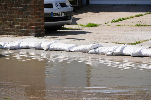 Sandbags to try to stop the water getting into people's homes