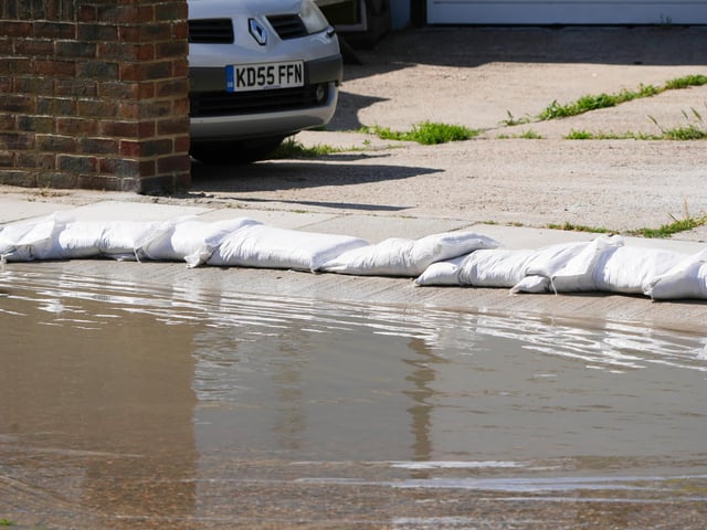 Sandbags to try to stop the water getting into people's homes