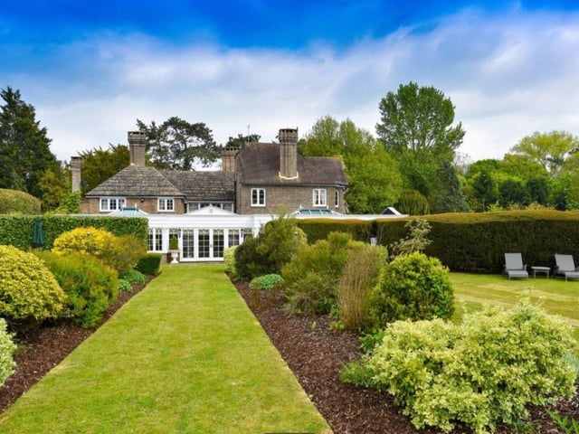 The 14 acres of grounds include formal gardens with well-stocked borders, as well as tennis court and swimming pool