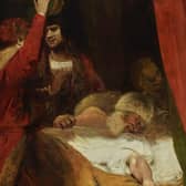The painting by Sir Joshua Reynolds shows The Death of Cardinal Beaufort (1377-1447). It is on display at Petworth House. Note the fiend by the pillow. (C) National Trust