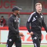 Crawley Town interim boss Lewis Young (left) admitted he ‘can’t speak highly enough’ of player-assistant manager Tony Craig (right). Picture by Cory Pickford
