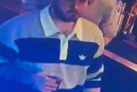 Police have released a CCTV image of a man they wish to speak to following an assault, which Sussex Police are treating as a homophobic hate crime, in Chichester city centre. Picture: Sussex Police