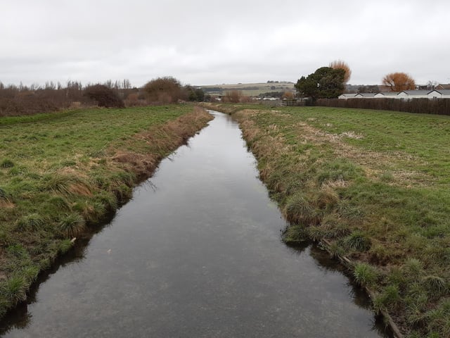 The bridge is also a good vantage point for turning back to get a view of Highdown Hill and the South Downs and a great spot for some reflective photography!
