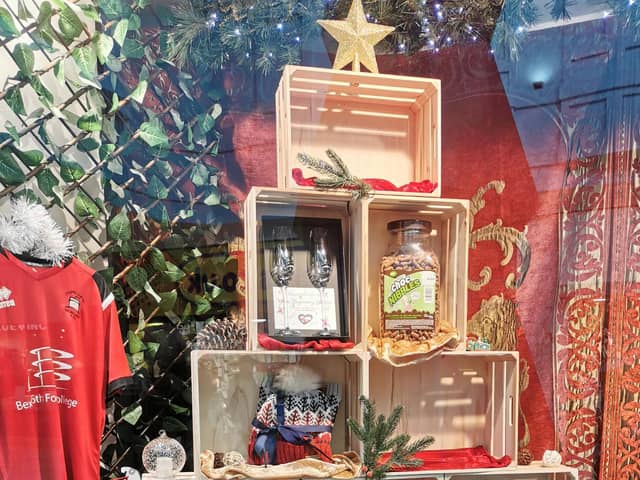 Shoppers can enjoy a warm festive glow by supporting Eastbourne’s independent shops in the countdown to Christmas – and be in with a chance of winning prizes. Picture: Eastbourne Borough Council
