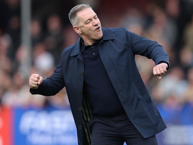 Scott Lindsey celebrates on his first game back in charge of Crawley Town