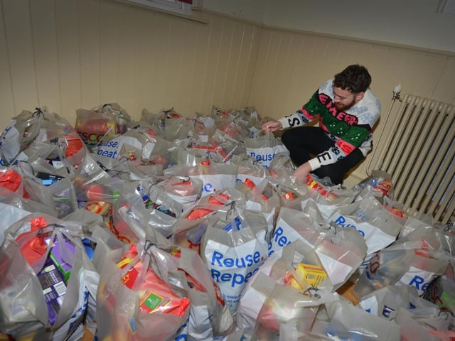 Surviving Christmas 2023 in Hastings on December 14: Packing and delivering hampers, and also sorting through the toys.