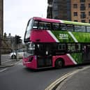 A zero emissions double decker bus is driven in central Belfast, Northern Ireland, on March 19, 2024. (Photo by PAUL ELLIS/AFP via Getty Images)