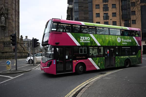 A zero emissions double decker bus is driven in central Belfast, Northern Ireland, on March 19, 2024. (Photo by PAUL ELLIS/AFP via Getty Images)