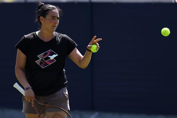 Ons Jabeur of Tunisia runs through a practice session during Day Two