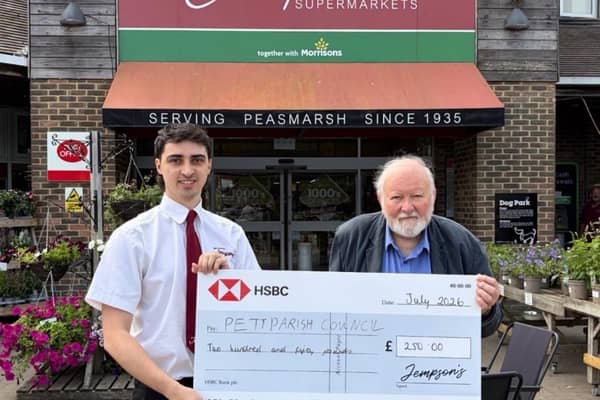 Jempsons present cheque to Pett parish Council for new play equipment