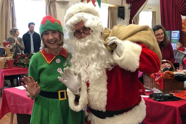 Father Christmas and his Elf delight youngsters at Rogate Christmas Market