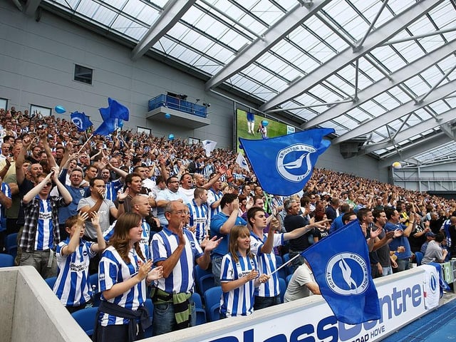 Brighton & Hove Albion supporters cheer their team during the npower Championship match between Brighton & Hove Albion and Blackpool at Amex Stadium on August 20, 2011.