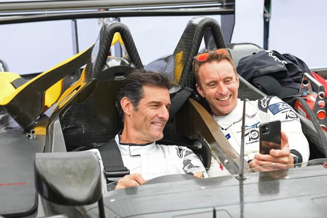 Former racing driver Mark Webber poses for a selfie with former driver Timo Bernard during the Goodwood Festival of Speed (Photo: John Nguyen /PA Wire)