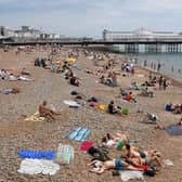 Sussex is set to sizzle this week as a heatwave sweeps across the UK but does it ever get hot enough to be sent home from work? Picture by Mike Hewitt/Getty Images