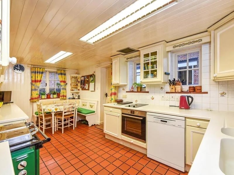 The ground floor also has a kitchen/breakfast room with Rayburn