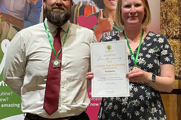 Gavin Mumford and Selena Peace from South Downs Nurseries receiving the hospice's award