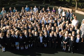 Staff and pupils at Elm Grove First School in Goring