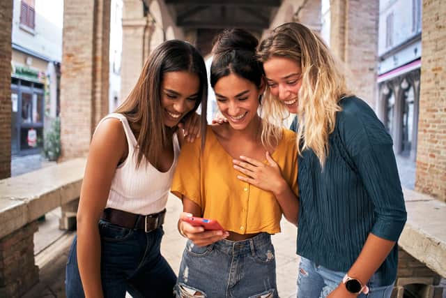 Katherine isn't sure she looks this happy when scrolling through her socials. Photo: Getty Images/iStockphoto