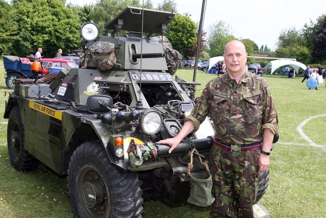 DM22060335a.jpg. Stephen Hogan with his Daimler Ferret Scout Car at the Boxgrove Village Hall Jubilee Street Party. Photo by Derek Martin Photography and Art.