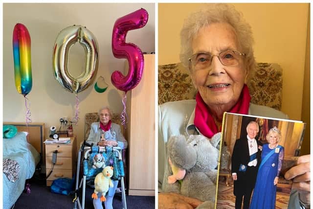 Jeannette Wishart with her card from the King and Queen, and with her birthday balloons