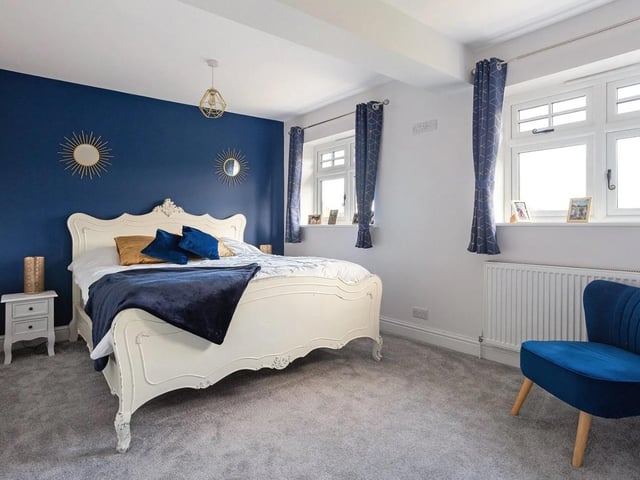 The first floor provides five bedrooms