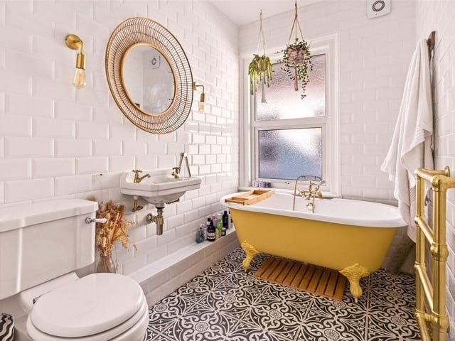 The luxurious family bathroom with freestanding roll-top bath
