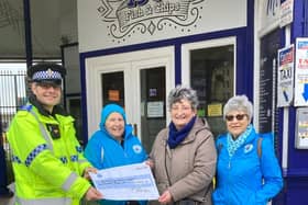 PCSO Dan Russell from Eastbourne Police, presented representatives from Friends of Eastbourne Seafront with a cheque for £500 on Tuesday, February 6. Picture: Eastbourne Police