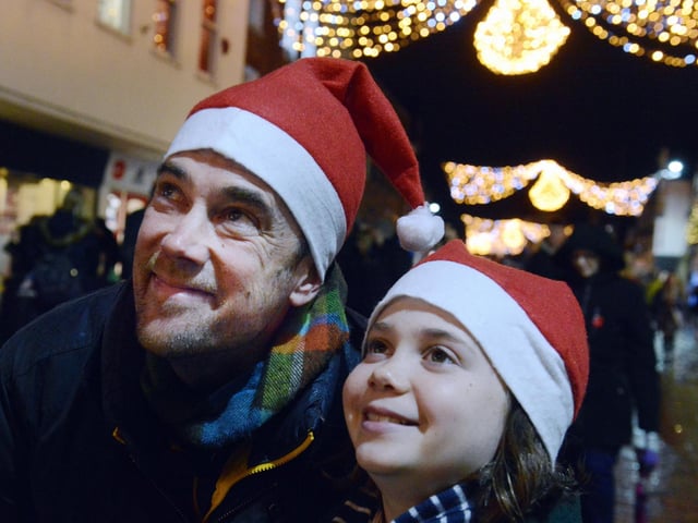 Gavin Mitchell and his daughter Holly, ten, looking at the lights in 2019