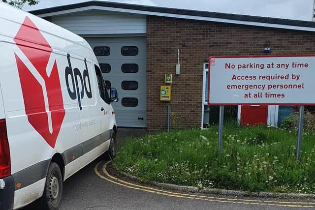 A delivery driver parked his van in front of a fire station emergency exit