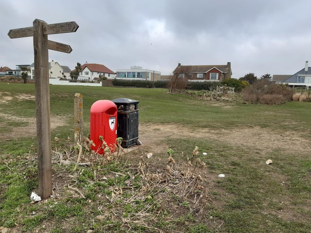 Keep your eyes out for a signpost pointing your way off the beach and on to the estate, it's not far past the stone seat