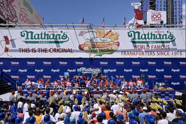 A past hot dog eating competition held by Nathan's Famous Hot Dogs