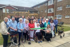 Crawley Borough Council and Wates staff with Carey House residents