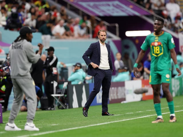 AL KHOR, QATAR - DECEMBER 04: Gareth Southgate, Head Coach of England, gives the team instructions during the FIFA World Cup Qatar 2022 Round of 16 match between England and Senegal at Al Bayt Stadium on December 04, 2022 in Al Khor, Qatar. (Photo by Clive Brunskill/Getty Images)