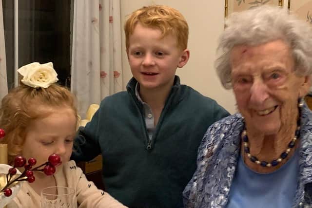 Josie Allen, 100, with two of her great grandchildren Cody and Joey Allen-Etchart