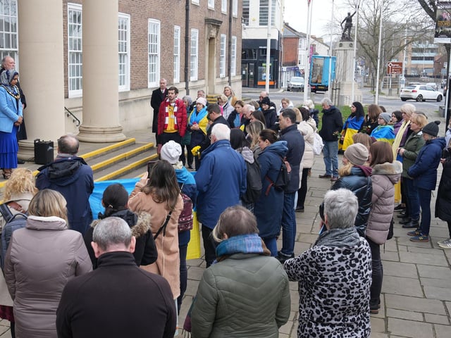 Dozens gathered outside Worthing Town Hall at 11am for a minute’s silence and prayer to mark one year since the Russian invasion of Ukraine began