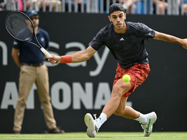 Argentina's Francisco Cerundolo returns to US player Tommy Paul during their men's singles final tennis match at the Rothesay Eastbourne International tennis tournament in Eastbourne, southern England, on July 1, 2023. (Photo by Glyn KIRK / AFP) (Photo by GLYN KIRK/AFP via Getty Images):Action from Saturday's finals at the Rothesay tennis international at Devonshire Park, Eastbourne