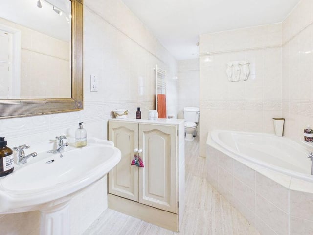 There are three bathrooms