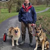 Mark with his two dogs' Ava and Bear.