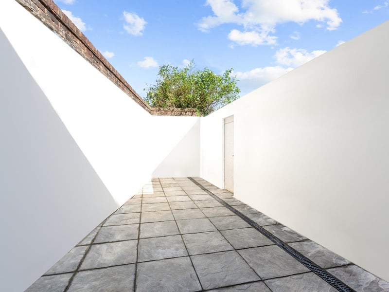 An enclosed patio garden