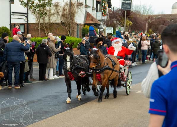 Santa's sleigh leads the way for the racers.
