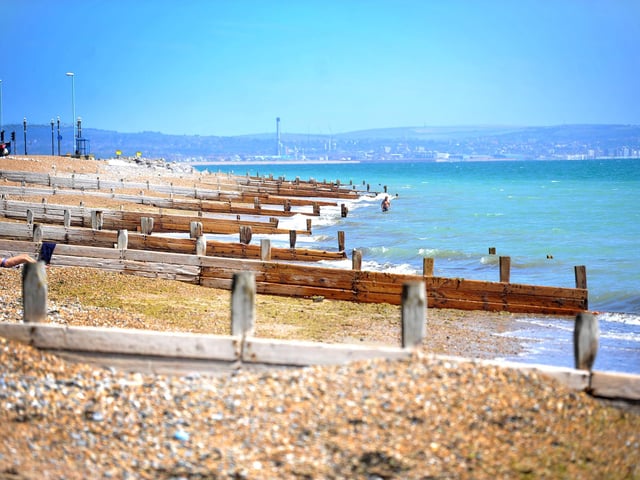 Enjoying the heatwave on Worthing beach. Pic S Robards SR2206152