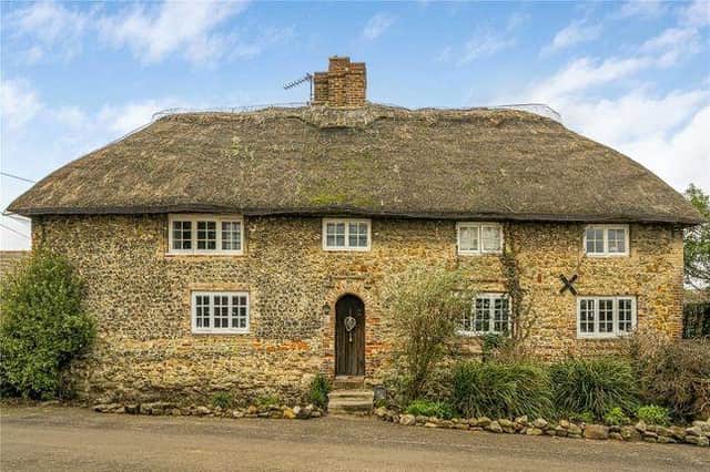 The property dates back to two farmhouses built in the 18th century. It became a single cottage in 1906 after a private purchase.