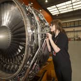 Easyjet engineer apprenticeship scheme engineer Sara Walsh working on an aircraft engine at easyjet Headquarters, Hangar 89, Luton Airport. Picture by Tim Anderson