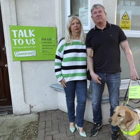 Carol Collis and Mark White with Embry the guide dog. Photo: staff