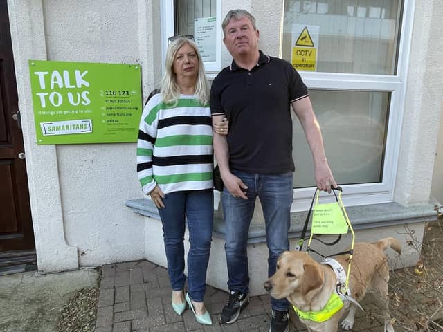Carol Collis and Mark White with Embry the guide dog. Photo: staff