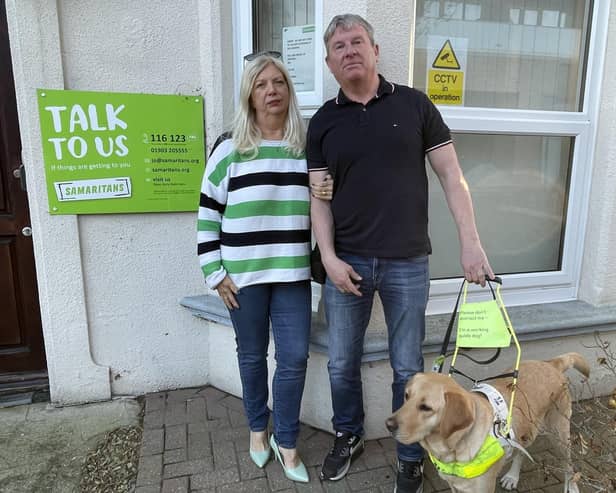 Carol Collis and Mark White with Embry the guide dog. Photo: staff